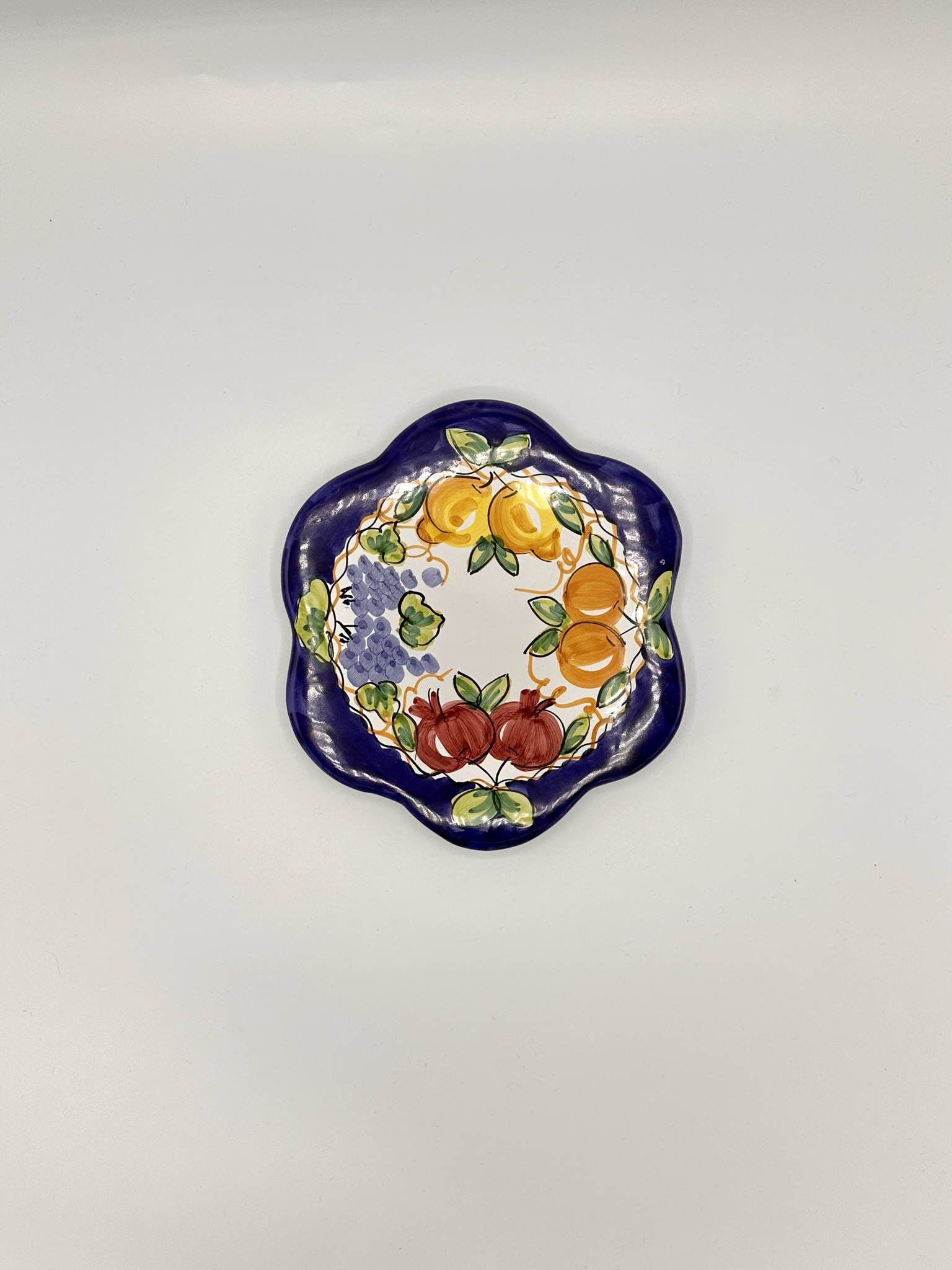 sottopentola in ceramica di vietri decoro frutta blu